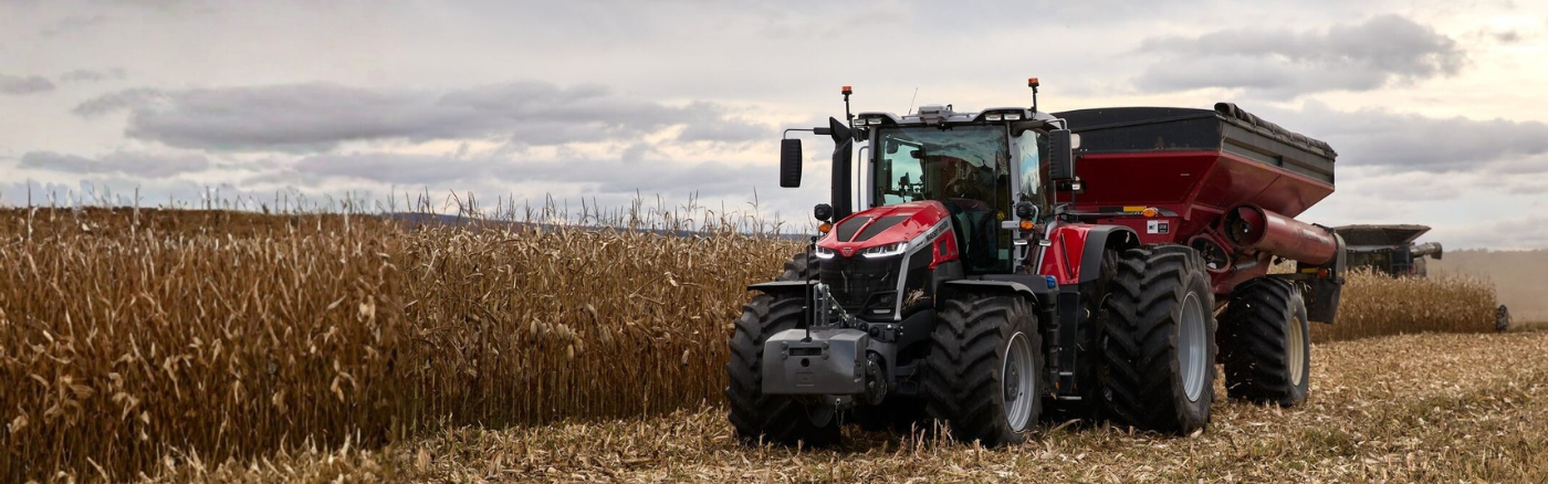 Promotional banner for Massey Ferguson Massey Moments featuring tractor working in cornfield